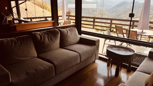 Living room with sofa and mountain view